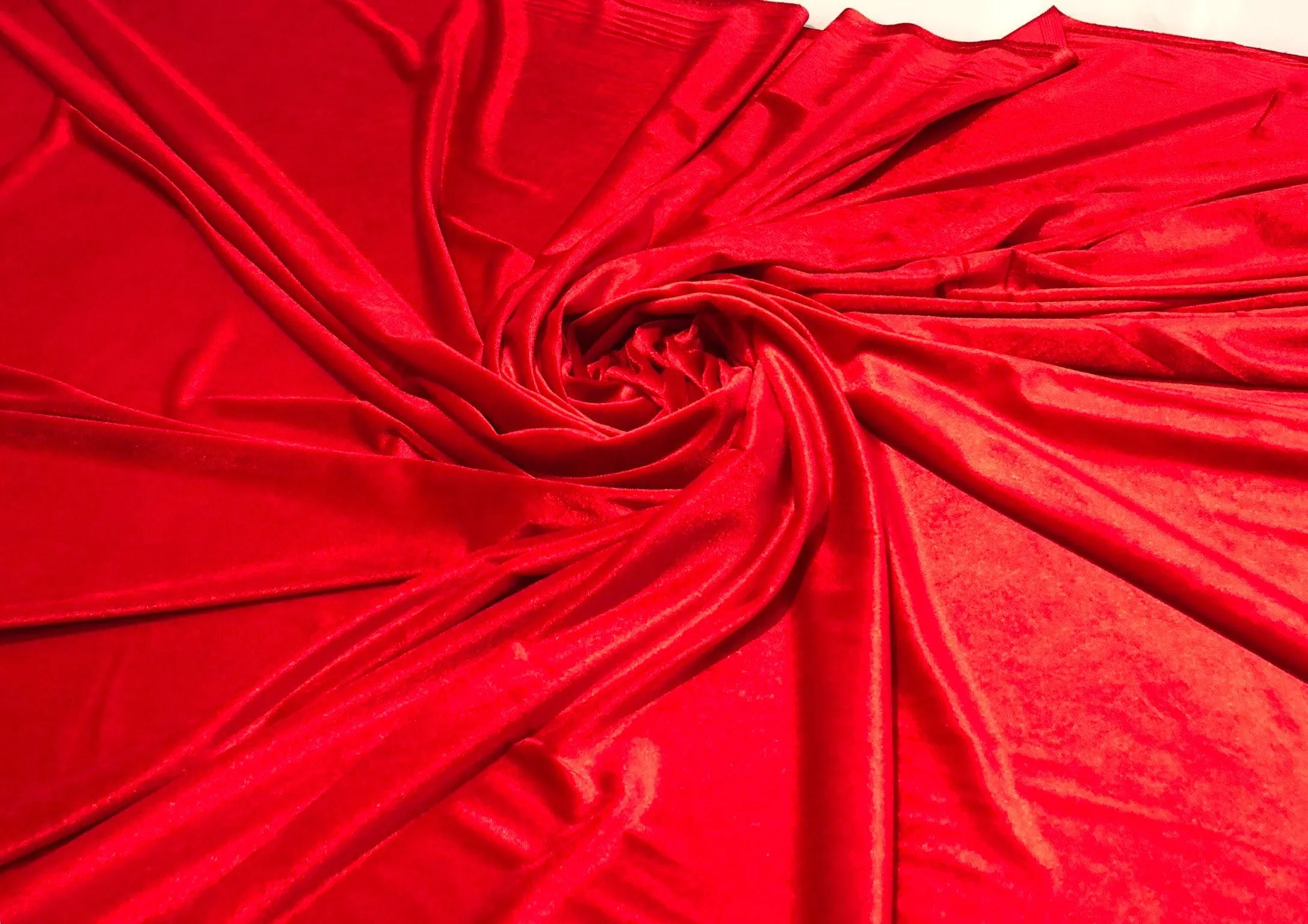 Stretch velvet 60&quot; wide     Beautiful red color     Fabric sold by the yard